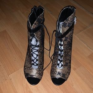 Heeled peep toe booties